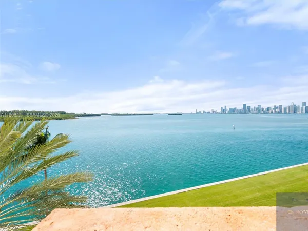 a view of a lake with a city view