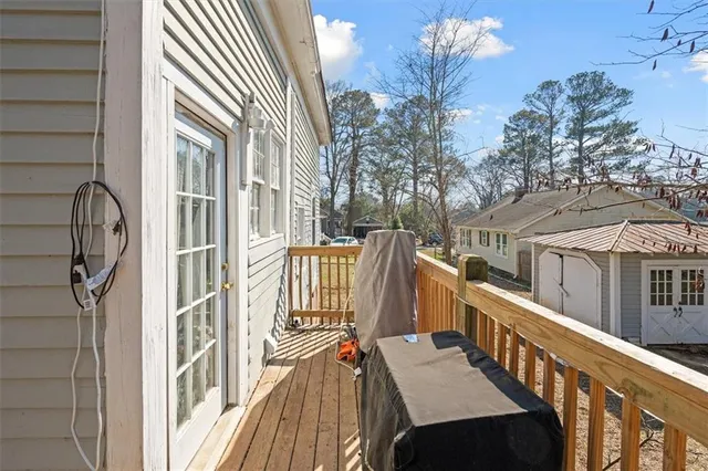 a view of balcony with furniture
