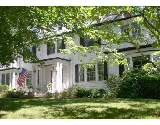 36 Roslyn Road Newton, MA 02468 - Photo 1 of 9 a front view of a house with a yard