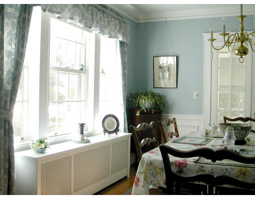 36 Roslyn Road Newton, MA 02468 - Photo 2 of 9 a living room with furniture and a window