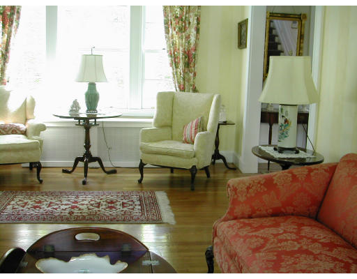 36 Roslyn Road Newton, MA 02468 - Photo 4 of 9 a living room with furniture and a fireplace