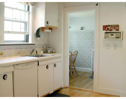 36 Roslyn Road Newton, MA 02468 - Photo 8 of 9 a bathroom with a sink and a mirror