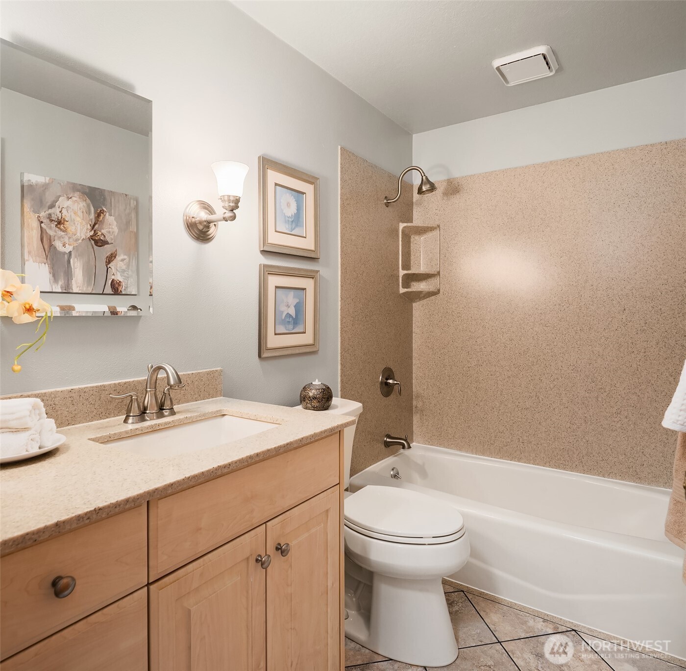 21331 2nd Avenue Southeast Bothell, WA 98021 - Photo 19 of 34 a bathroom with a toilet a sink a mirror and a bathtub