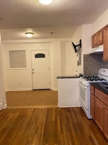 a view of kitchen and utility room