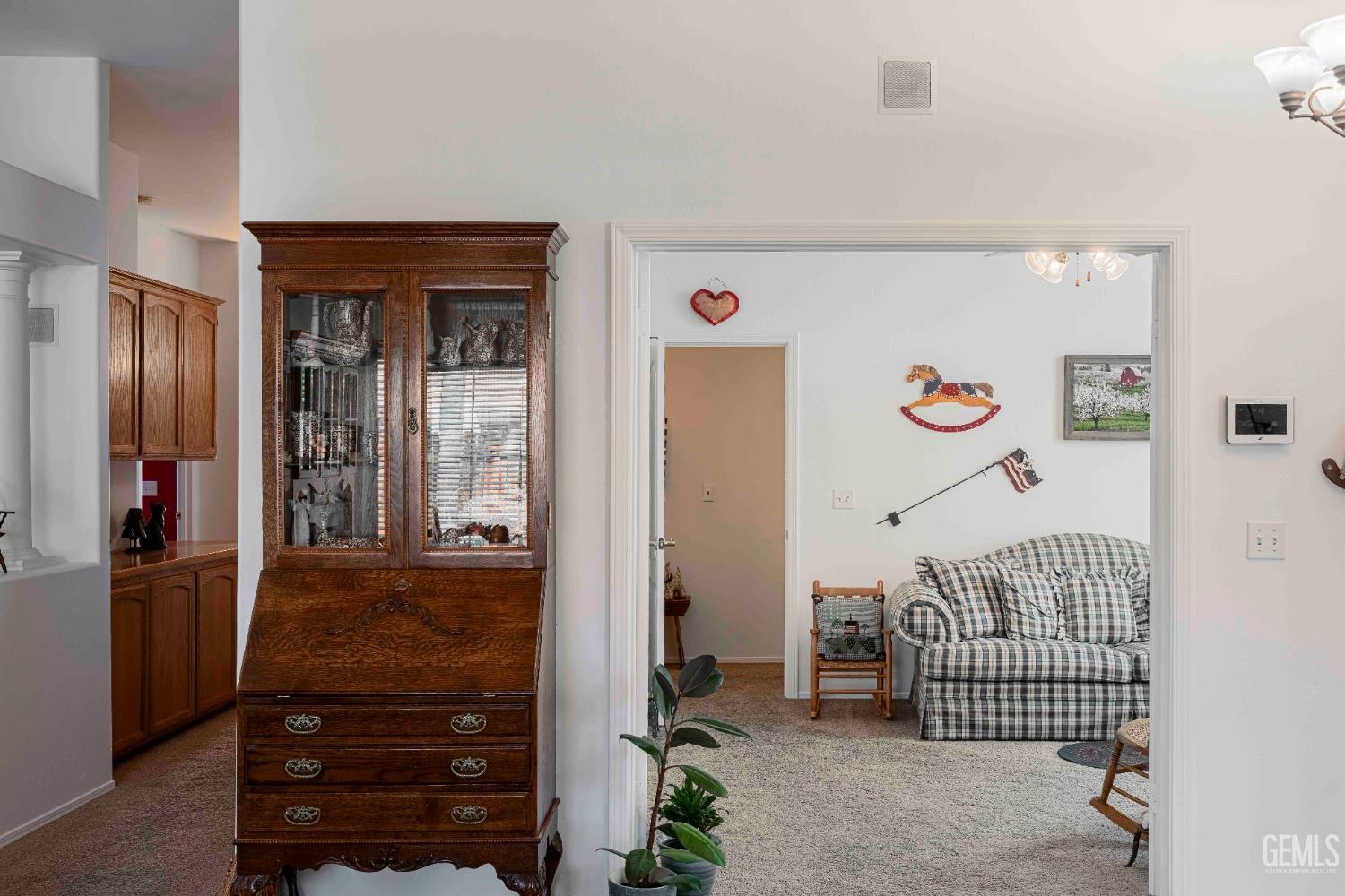 Undisclosed Address Bakersfield, CA 93312 - Photo 19 of 43 a view of a hallway with closet