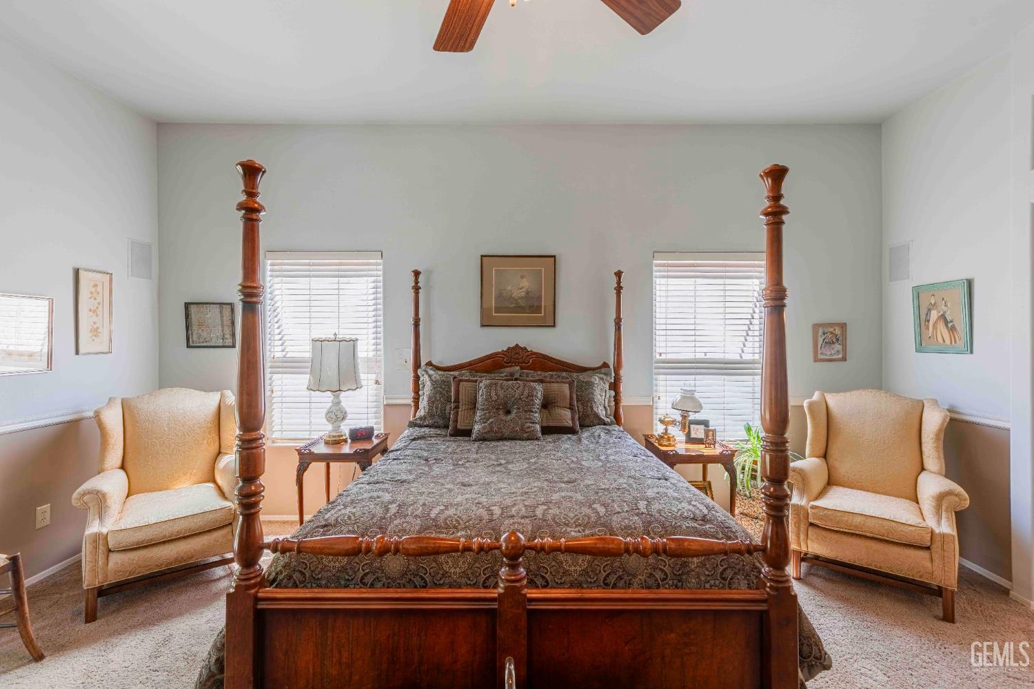 Undisclosed Address Bakersfield, CA 93312 - Photo 23 of 43 a bedroom with a large bed and a couch