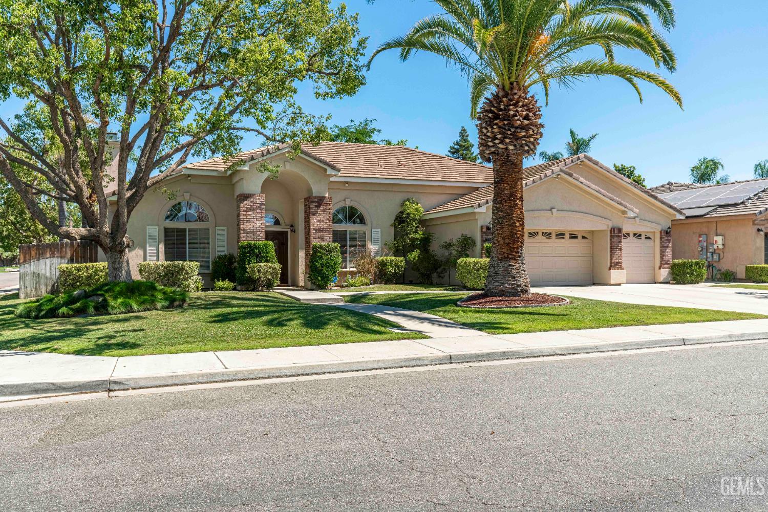 Undisclosed Address Bakersfield, CA 93312 - Photo 3 of 43 a view of house with outdoor space and tree s
