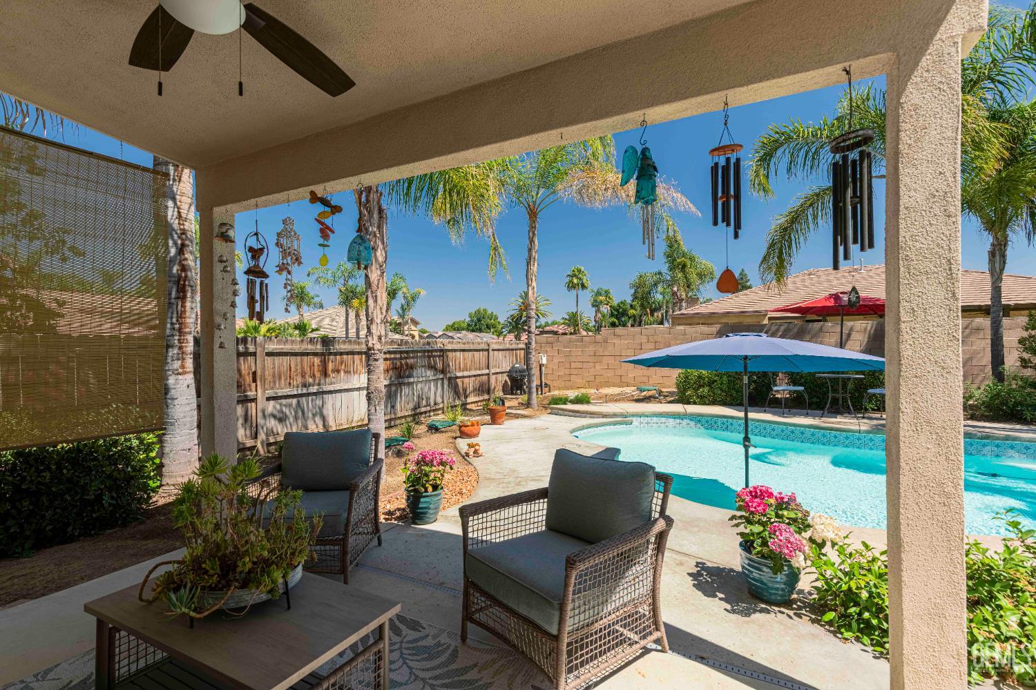 Undisclosed Address Bakersfield, CA 93312 - Photo 33 of 43 a outdoor living space with furniture potted plant and a large window