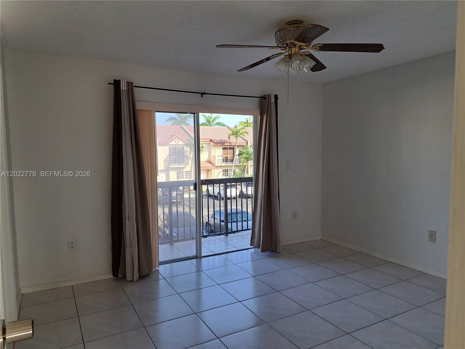 6140 Southwest 129th Place, Unit 2007 Miami, FL 33183 - Photo 14 of 21 Master Bedroom with Balcony