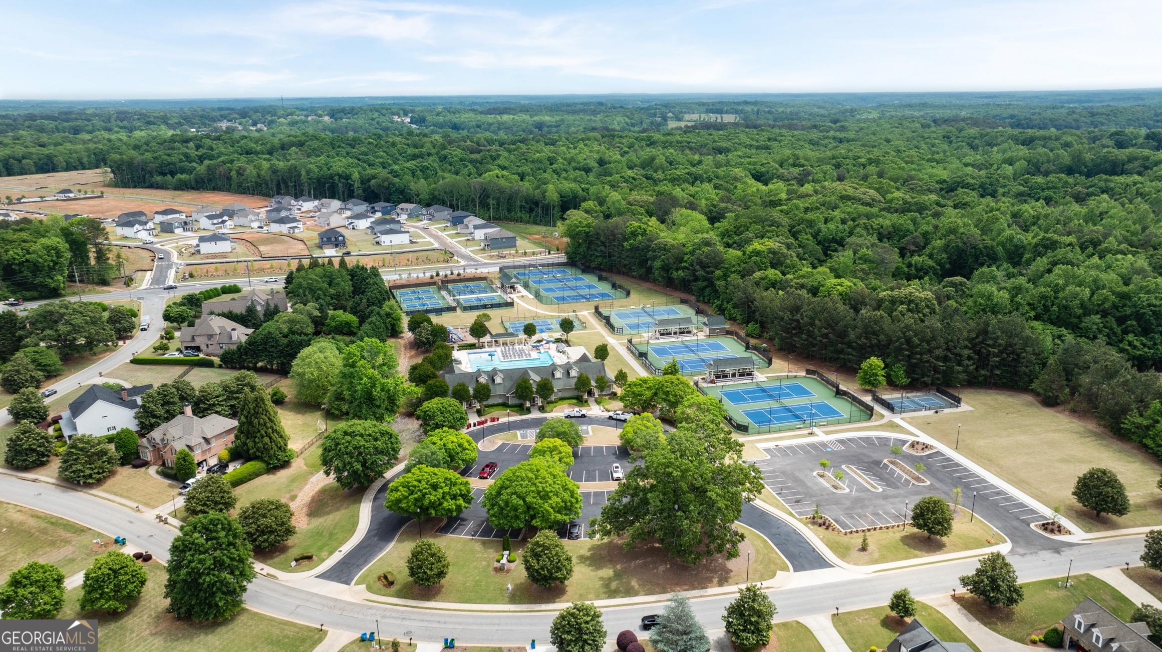 12 Overview Court Hoschton, GA 30548 - Photo 57 of 57 an aerial view of residential houses with outdoor space