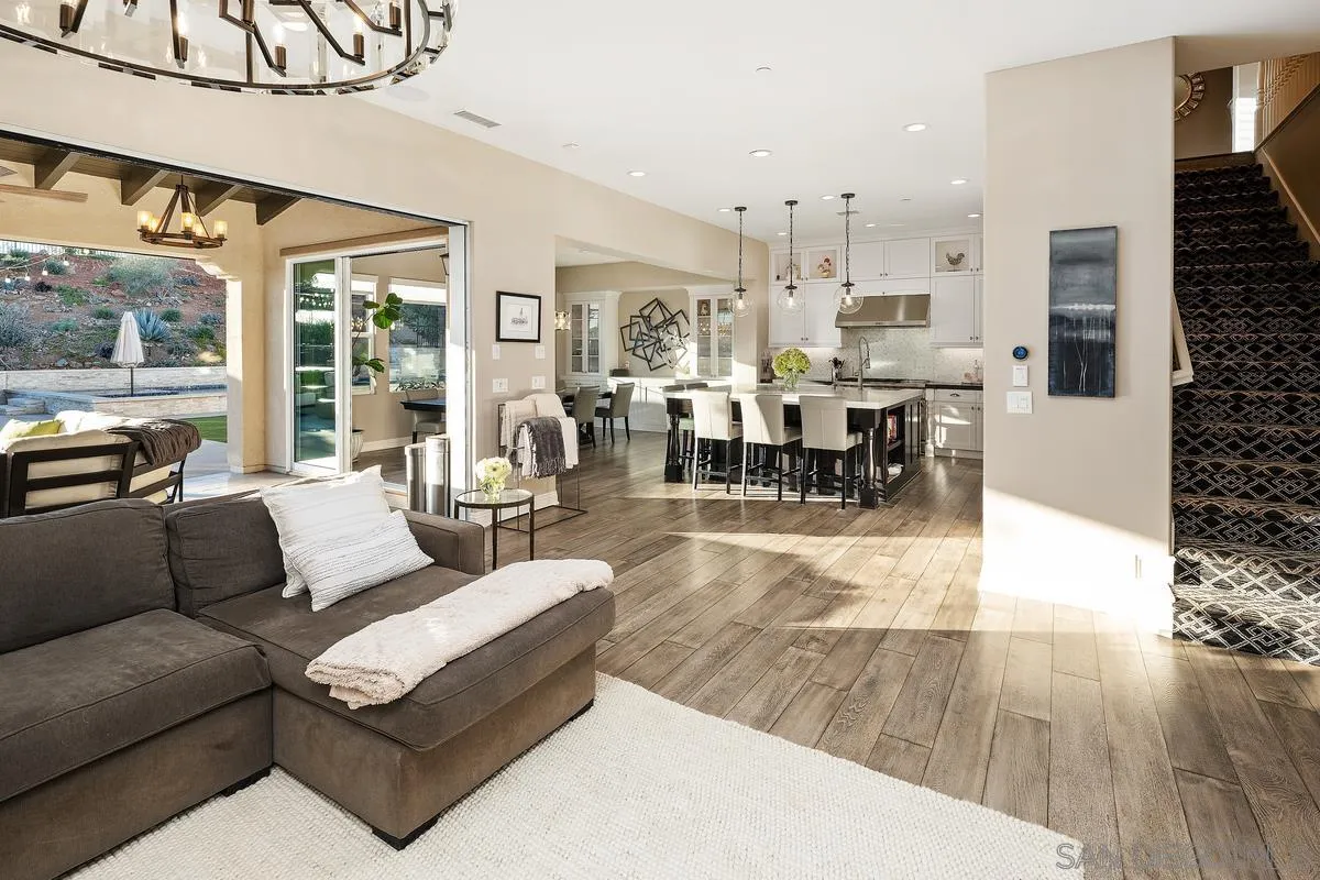 7495 Paseo Cristal Carlsbad, CA 92009 - Photo 23 of 75 a living room with furniture and a large window