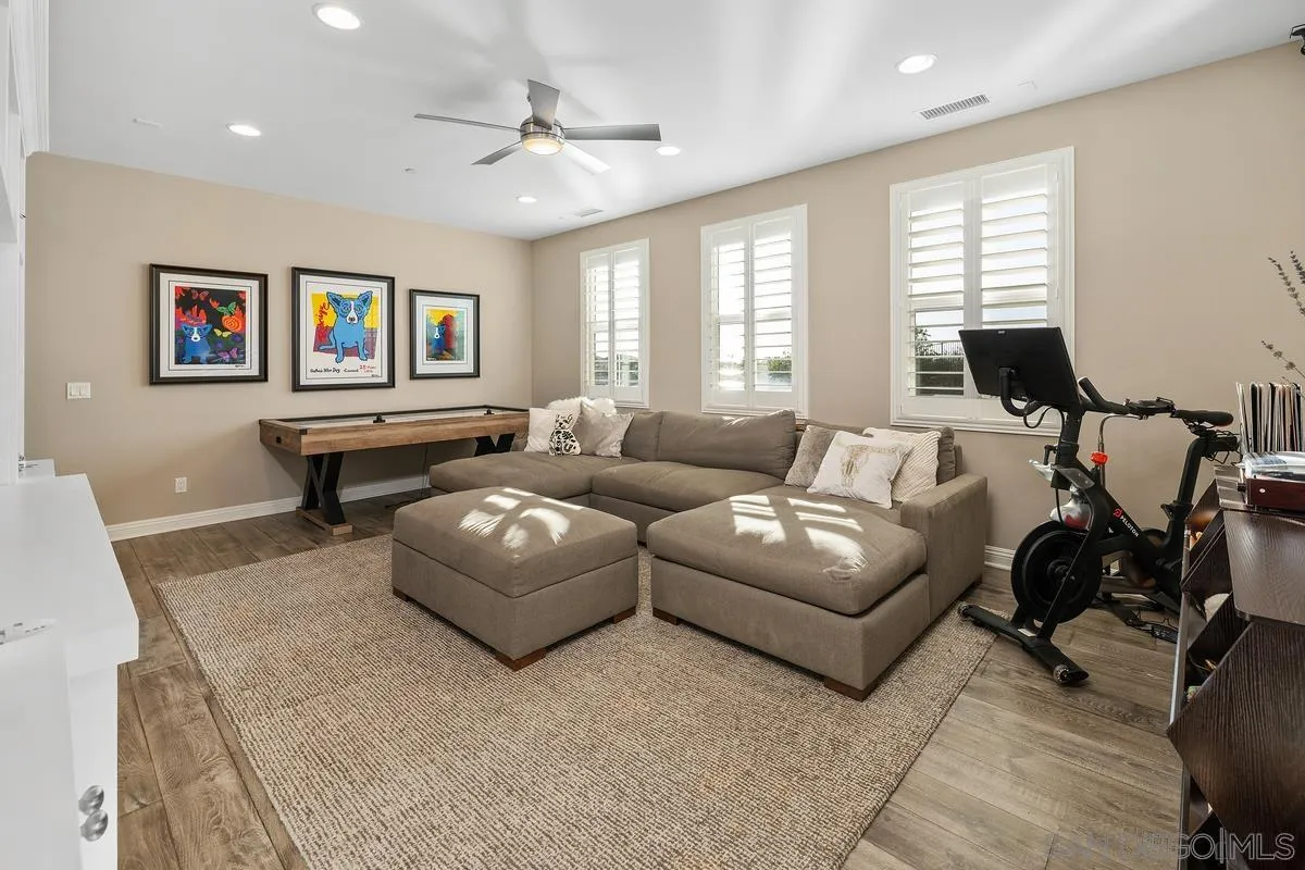 7495 Paseo Cristal Carlsbad, CA 92009 - Photo 43 of 75 a living room with furniture and a large window