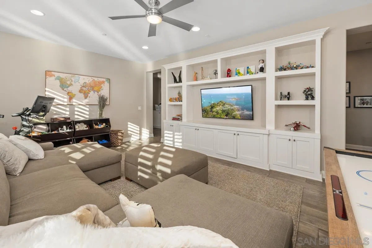 7495 Paseo Cristal Carlsbad, CA 92009 - Photo 44 of 75 a living room with furniture and a window