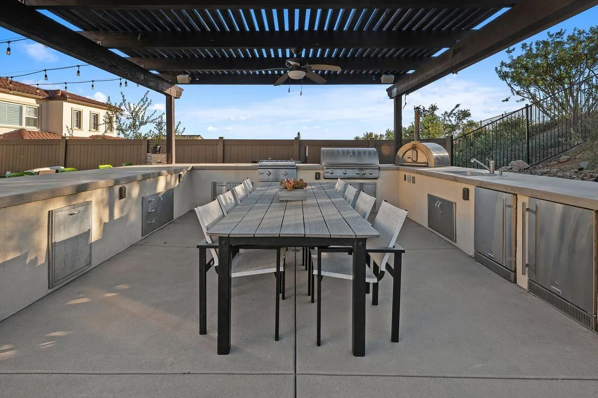 7495 Paseo Cristal Carlsbad, CA 92009 - Photo 57 of 75 a view of a chairs and table in the kitchen