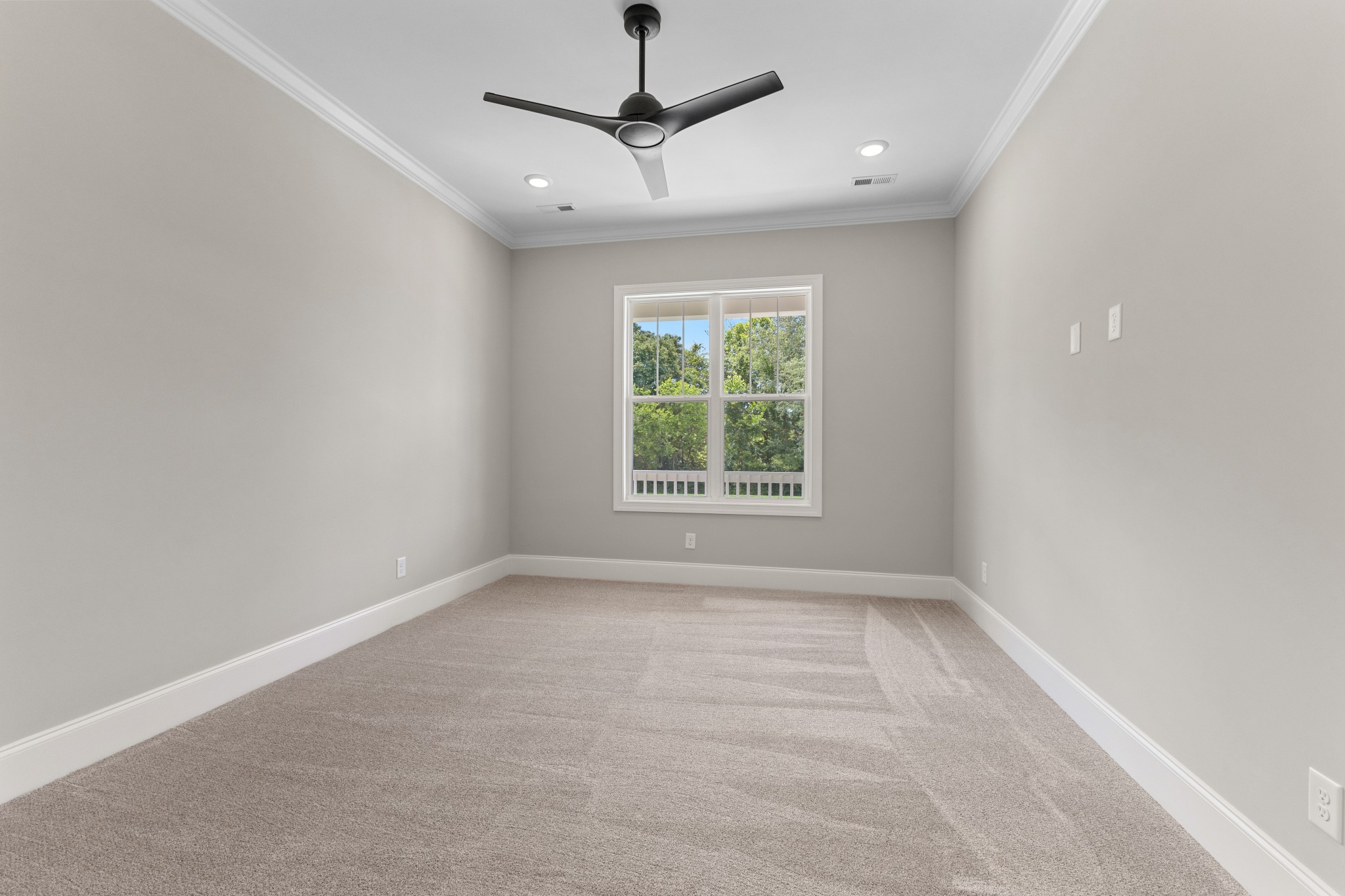 7131 Frances Street Fairview, TN 37062 - Photo 11 of 54 en empty room with windows and ceiling fan