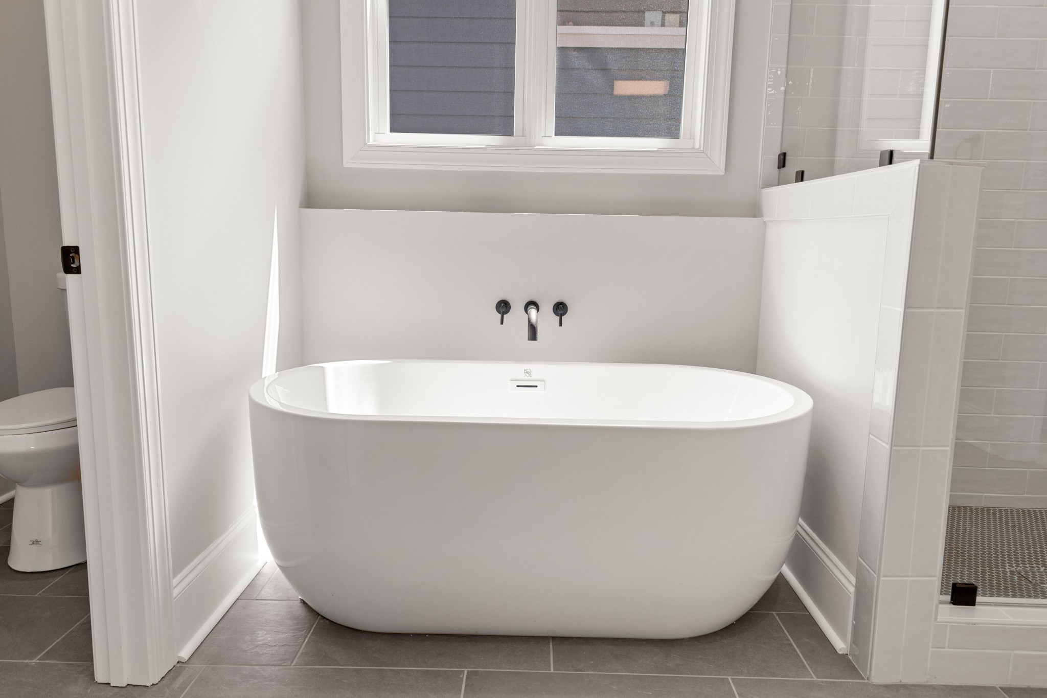 7131 Frances Street Fairview, TN 37062 - Photo 16 of 54 a white bath tub sitting in a bathroom