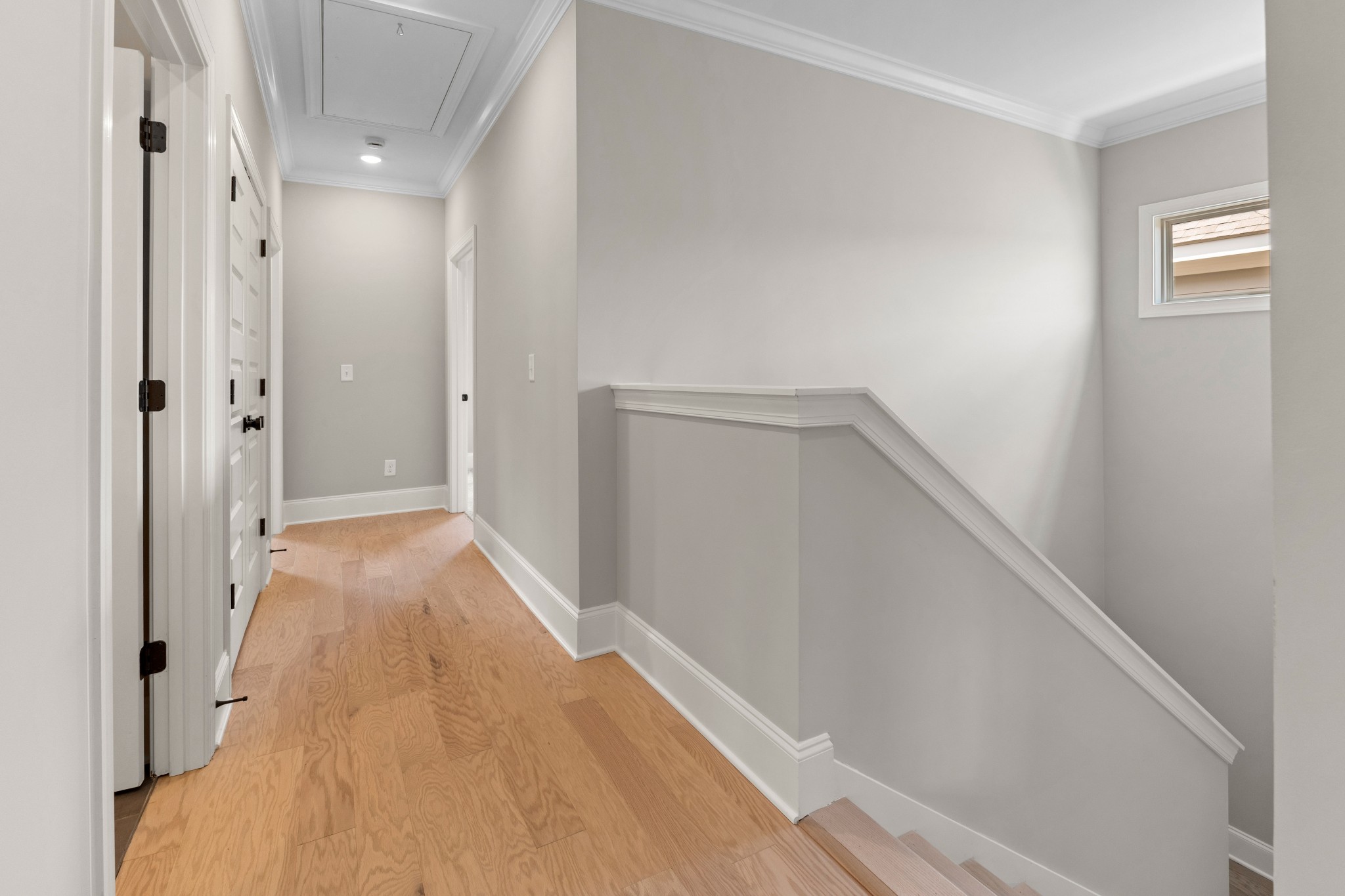 7131 Frances Street Fairview, TN 37062 - Photo 29 of 54 a view of a hallway with wooden floor and staircase