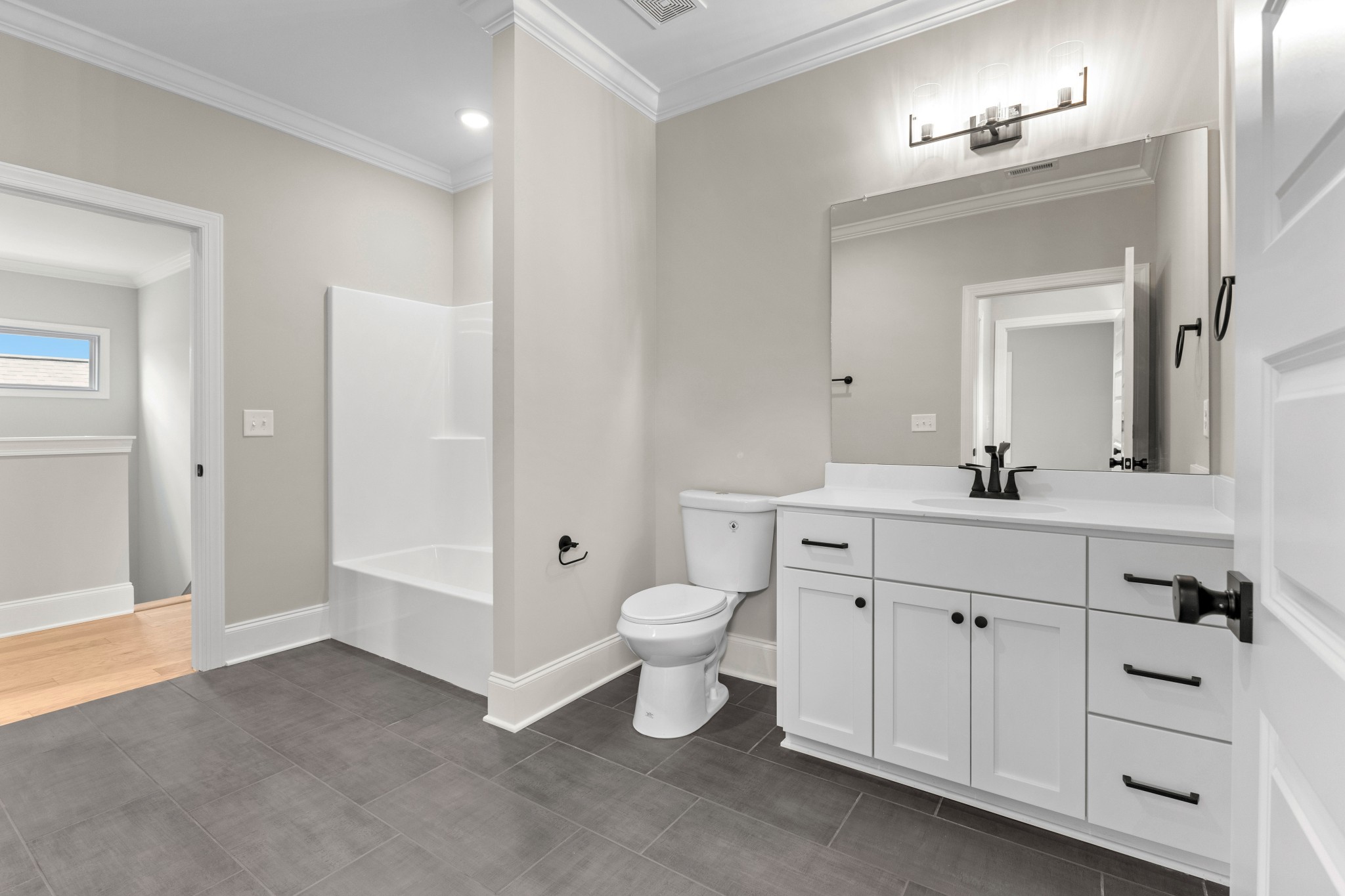 7131 Frances Street Fairview, TN 37062 - Photo 33 of 54 a bathroom with a toilet sink and mirror