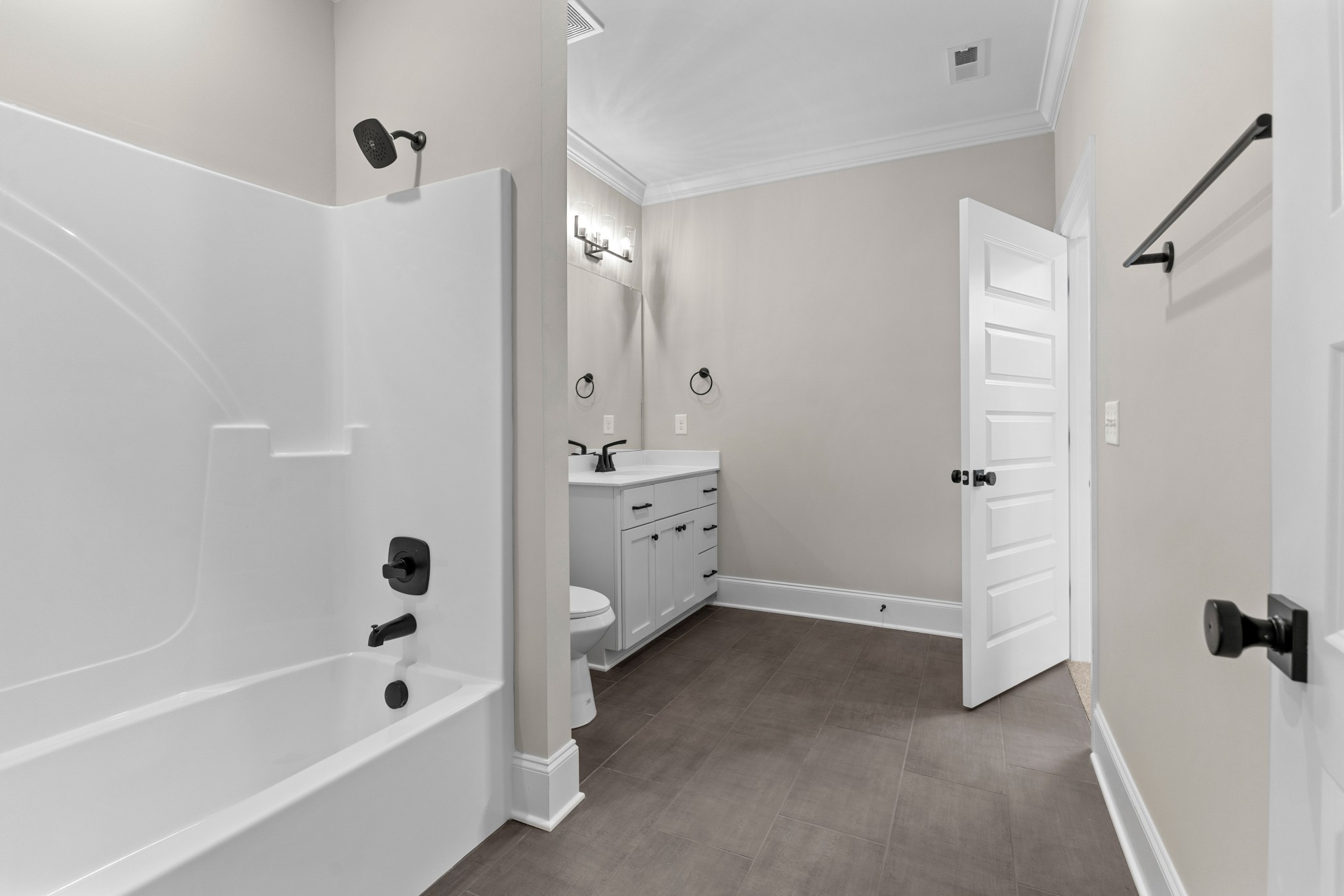 7131 Frances Street Fairview, TN 37062 - Photo 34 of 54 a bathroom with a bathtub and a shower