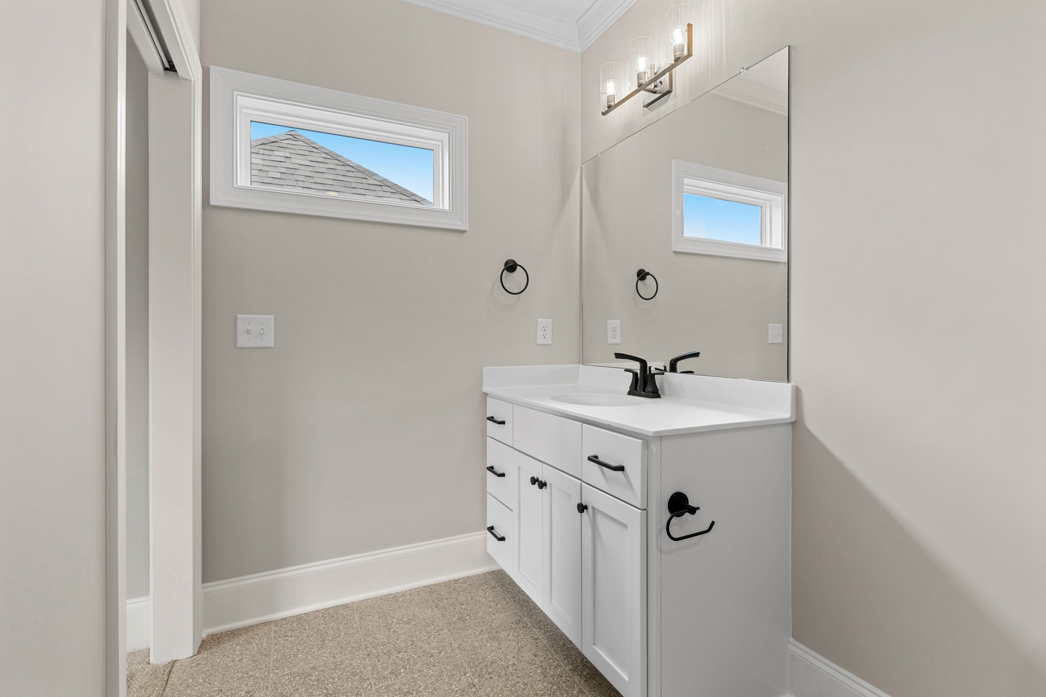 7131 Frances Street Fairview, TN 37062 - Photo 38 of 54 a bathroom with a double vanity sink a mirror and a shower