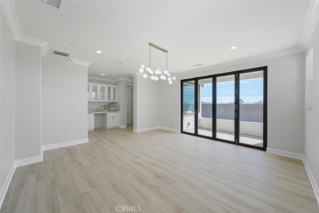 13705 Copley Drive Rancho Cucamonga, CA 91739 - Photo 8 of 13 a view of an empty room with a window