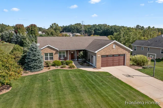 $465,000 | 311 Indian Bluffs Northeast, Sparta, MI 49345