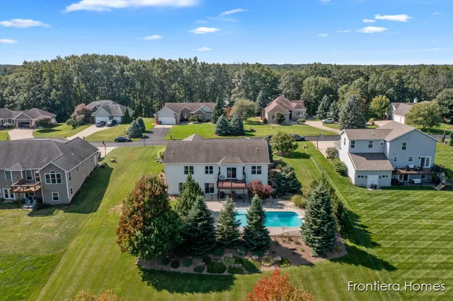 $465,000 | 311 Indian Bluffs Northeast, Sparta, MI 49345