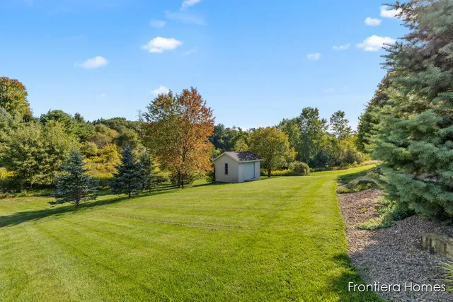 $465,000 | 311 Indian Bluffs Northeast, Sparta, MI 49345