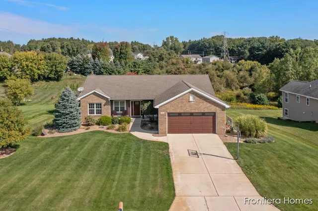 $465,000 | 311 Indian Bluffs Northeast, Sparta, MI 49345
