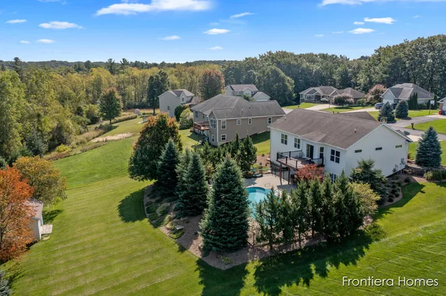 $465,000 | 311 Indian Bluffs Northeast, Sparta, MI 49345