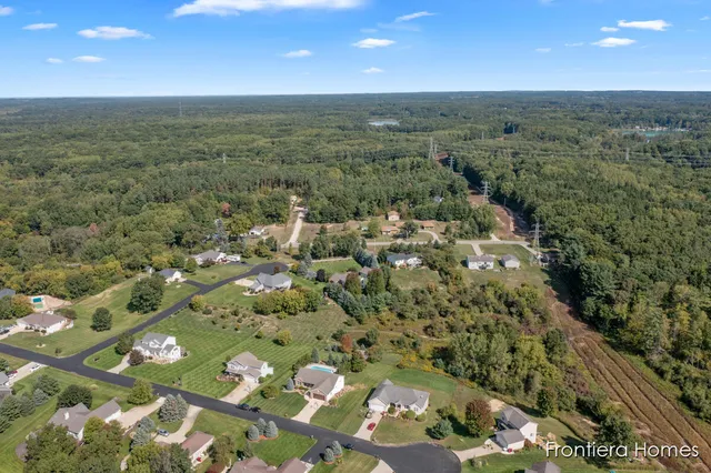 $465,000 | 311 Indian Bluffs Northeast, Sparta, MI 49345