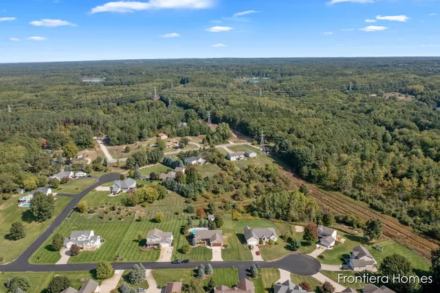 $465,000 | 311 Indian Bluffs Northeast, Sparta, MI 49345