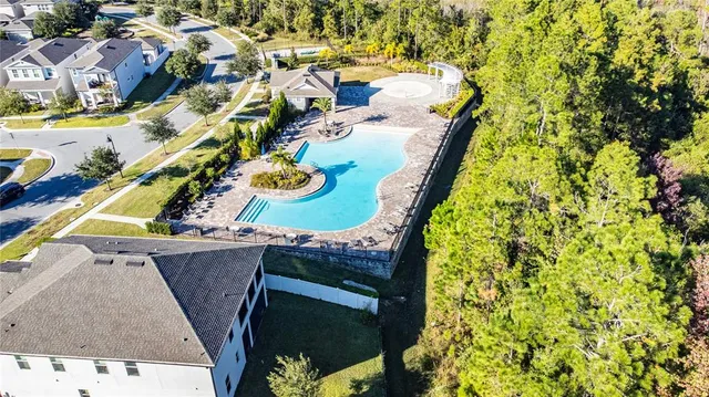 view of a balcony with chairs and table