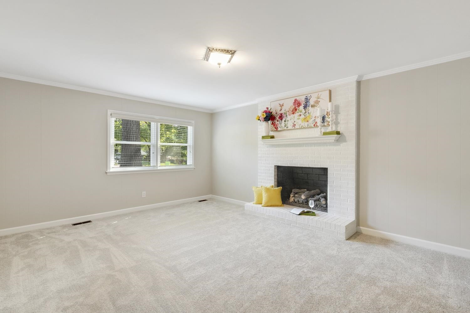 708 Dartmouth Road Raleigh, NC 27609 - Photo 5 of 15 The lower level living room has a nice fireplace. Everything needed for multigenerational living: bedroom, full bath, living room. . Living Room