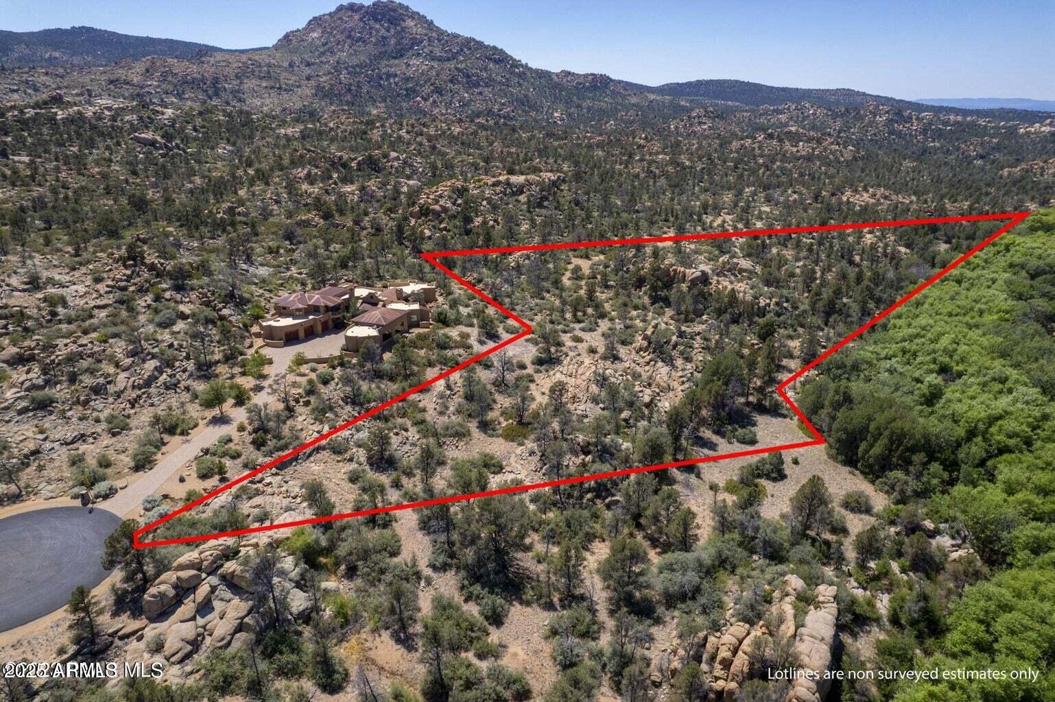 4755 Phantom Hill Road, Unit 163 Prescott, AZ 86305 - Photo 1 of 14 a view of a city with mountain