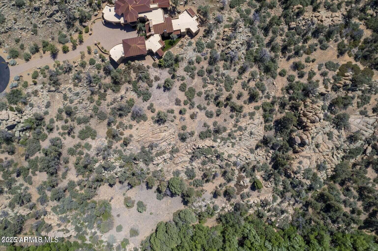 4755 Phantom Hill Road, Unit 163 Prescott, AZ 86305 - Photo 13 of 14 a view of a dry yard