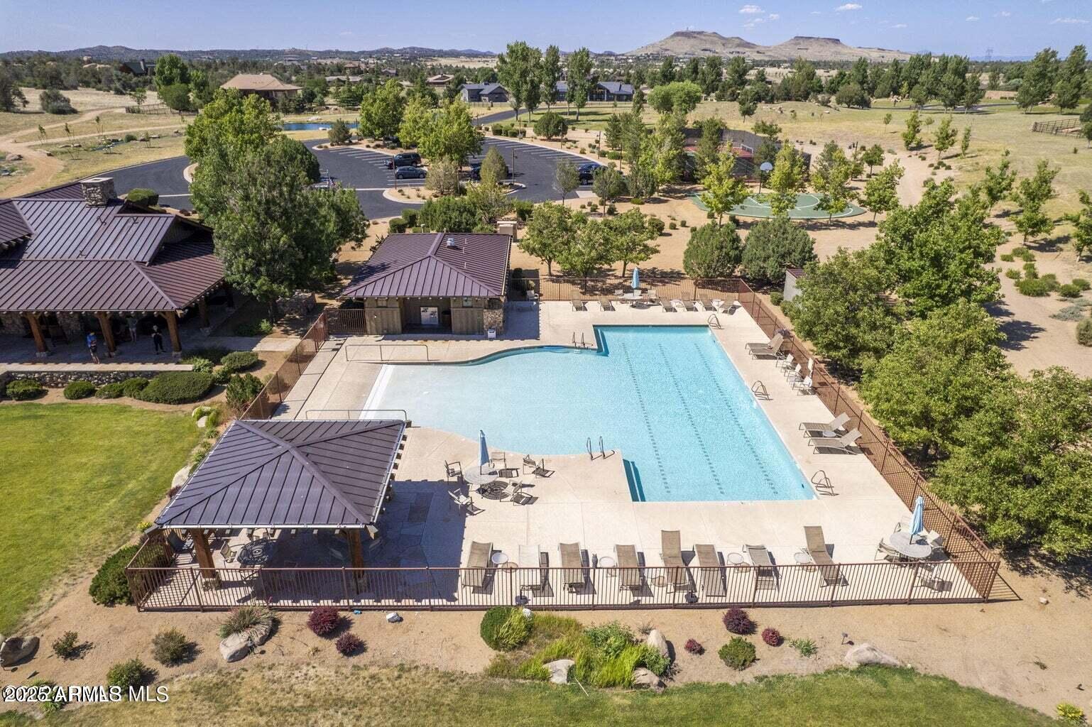 4755 Phantom Hill Road, Unit 163 Prescott, AZ 86305 - Photo 4 of 14 an aerial view of houses with yard