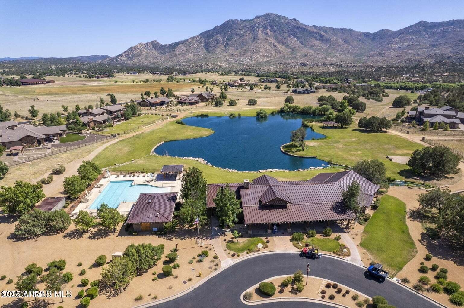4755 Phantom Hill Road, Unit 163 Prescott, AZ 86305 - Photo 6 of 14 an aerial view of residential houses with outdoor space and river