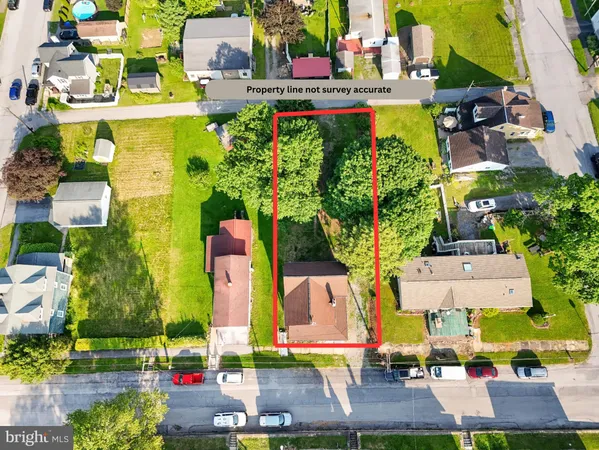 an aerial view of multiple houses with yard