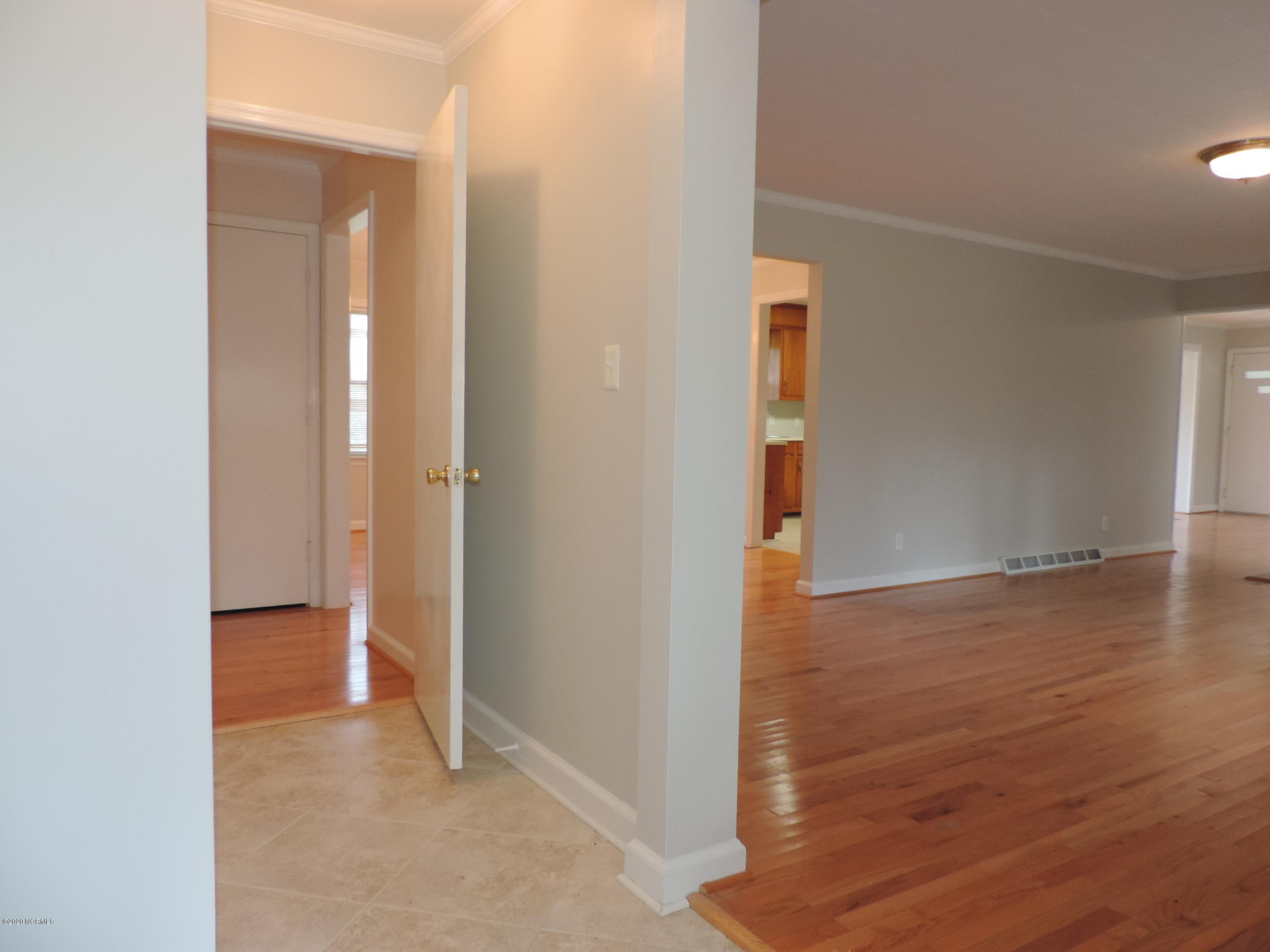 411 Flanners Beach Road New Bern, NC 28560 - Photo 3 of 44 entry with living room to the right