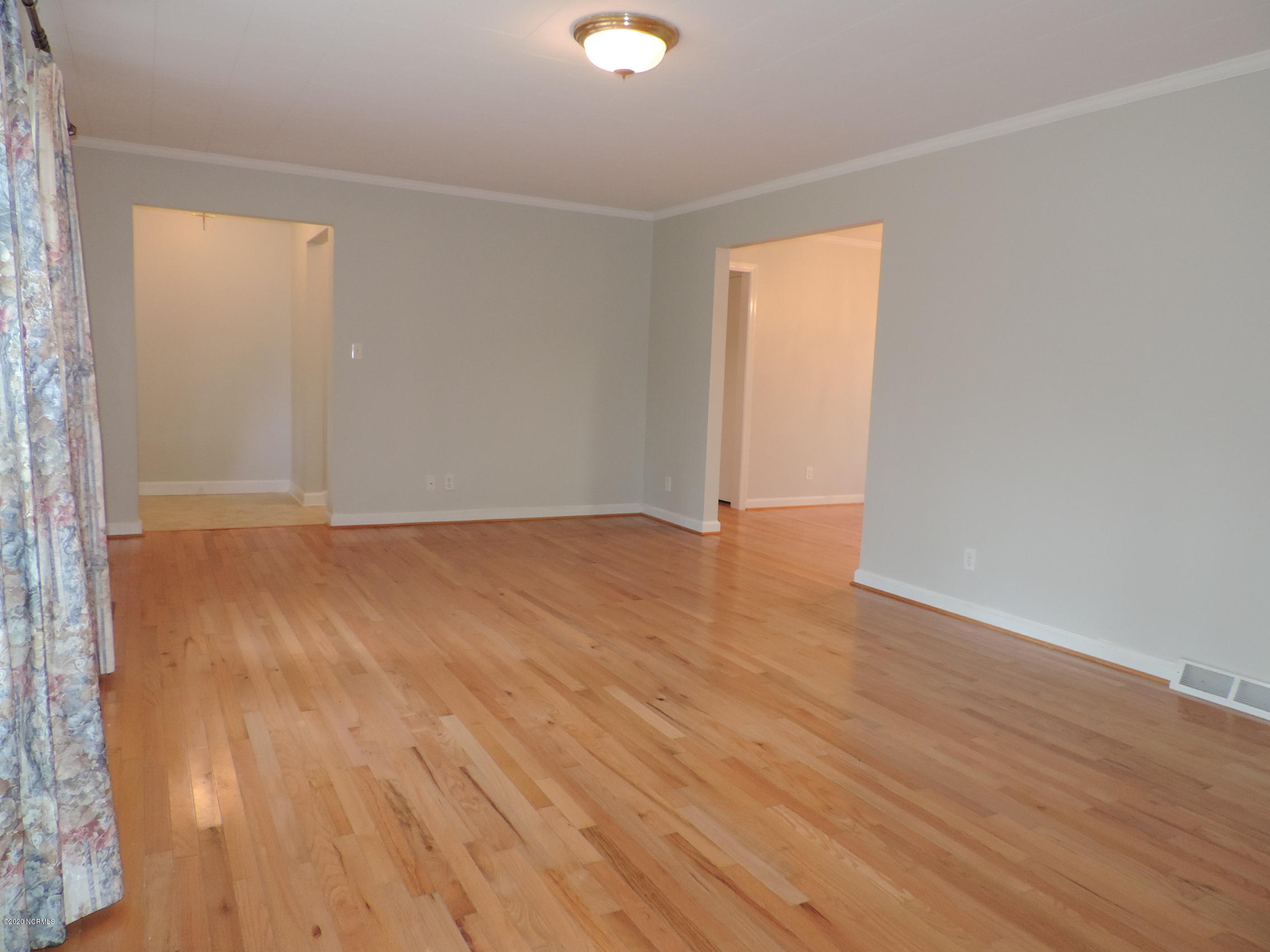 411 Flanners Beach Road New Bern, NC 28560 - Photo 7 of 44 LR w/foyer to the left