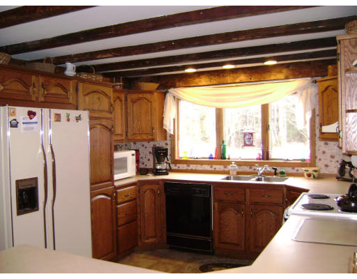 651 S Road Templeton, MA 01468 - Photo 1 of 22 a kitchen with a sink a refrigerator and a stove