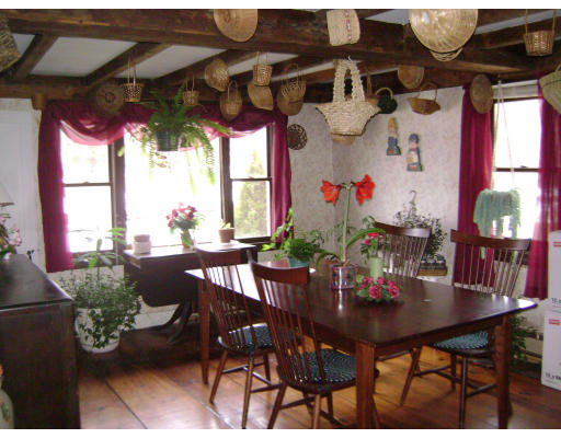 651 S Road Templeton, MA 01468 - Photo 8 of 22 a view of a dining room with furniture and window
