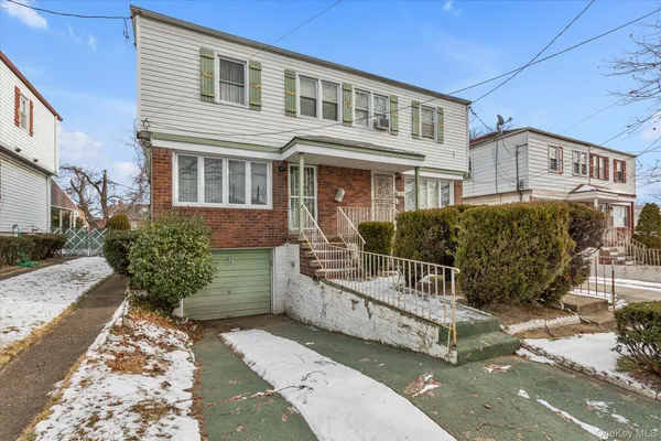 a front view of a house with balcony