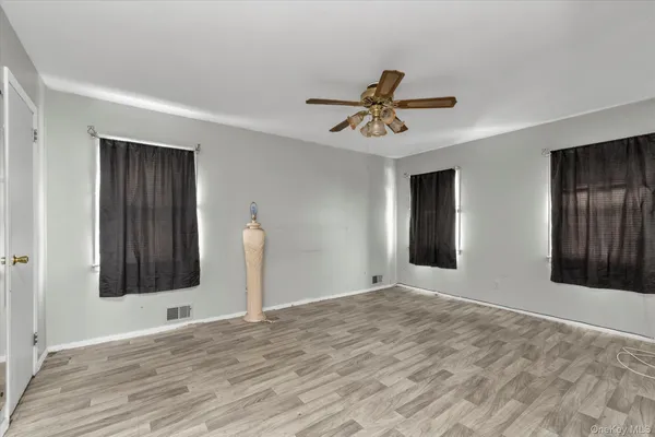 a view of a livingroom with a flat screen tv