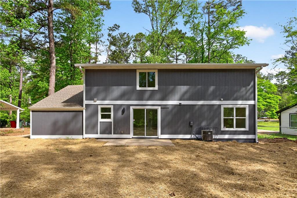 170 Kipling Way Riverdale, GA 30274 - Photo 14 of 16 front view of a house with a yard