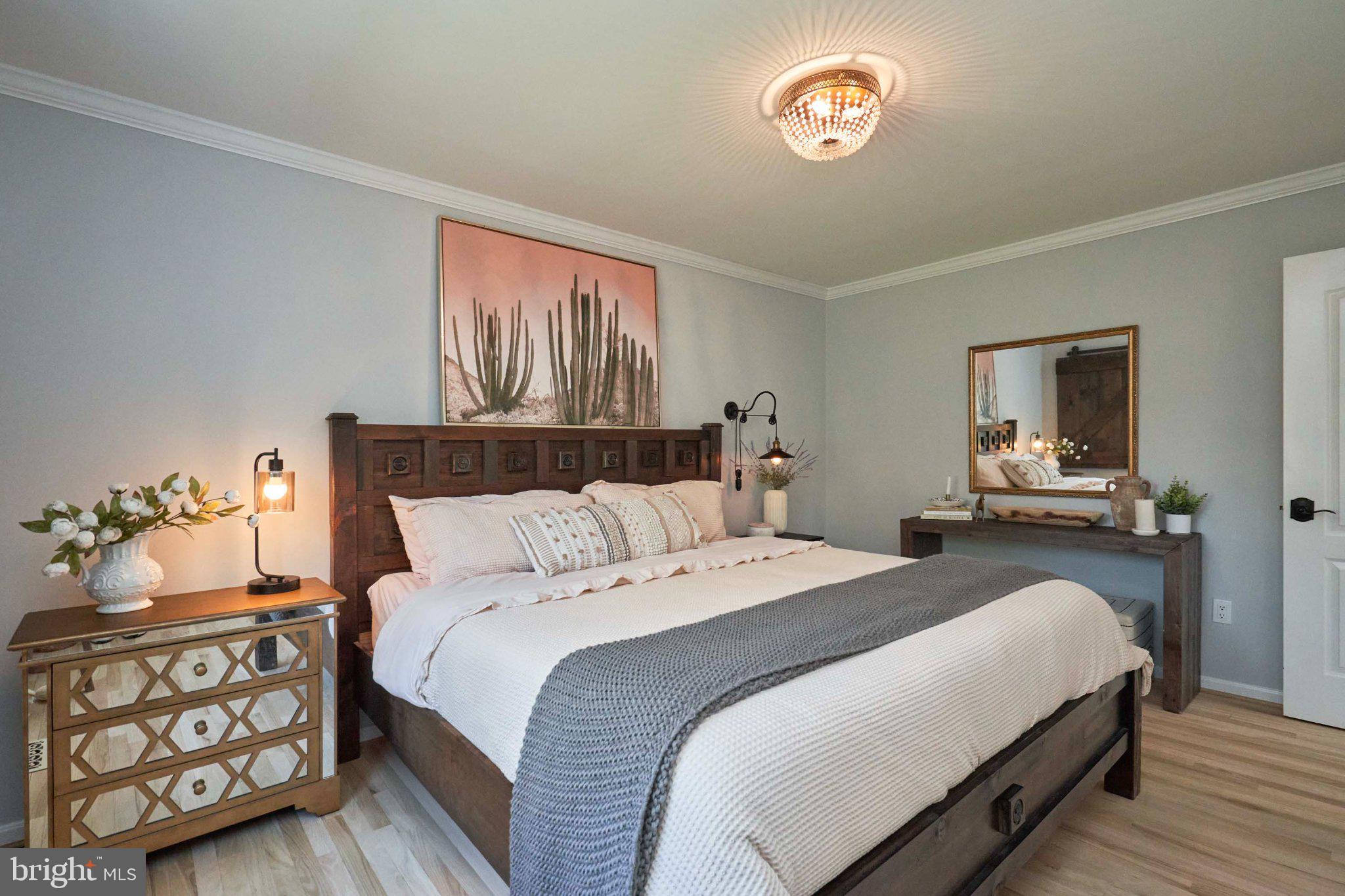 3270 Fox Mill Road Oakton, VA 22124 - Photo 36 of 66 Serene bedroom with modern charm.