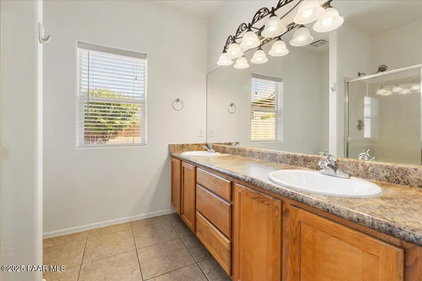 a white bath tub sitting next to a window