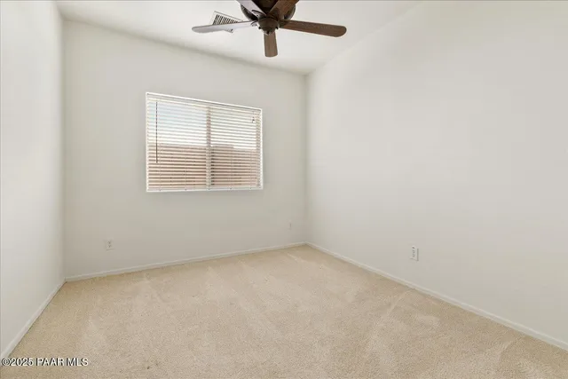 a view of a backyard of the house