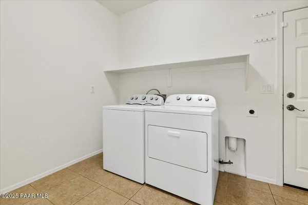 a bathroom with a sink mirror and vanity